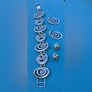 Brighton bracelet and 2 earrings sets.